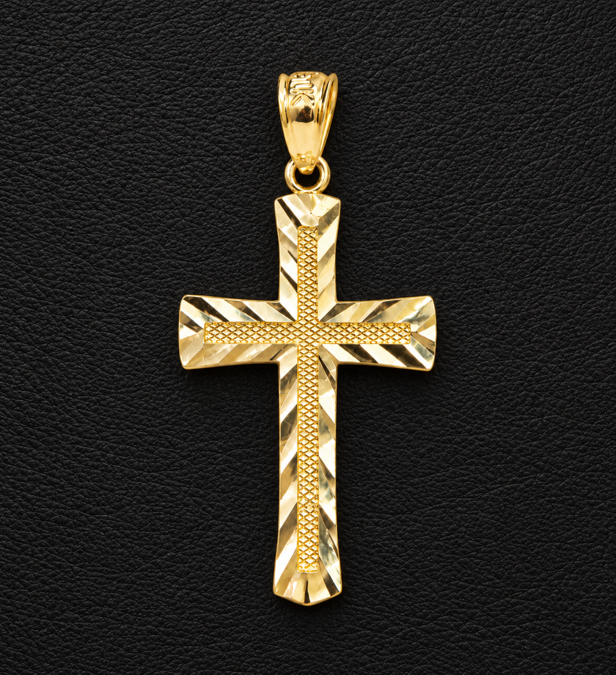 10K yellow gold diamond cut cross pendant with textured center on black leather, 1.08 grams